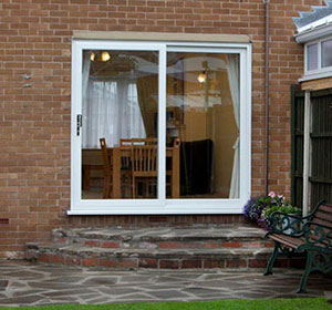 Photo of patio doors from garden by Elmhurst Windows